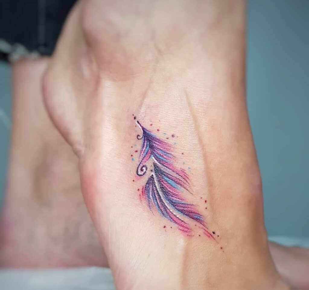 Feather watercolor tattoo